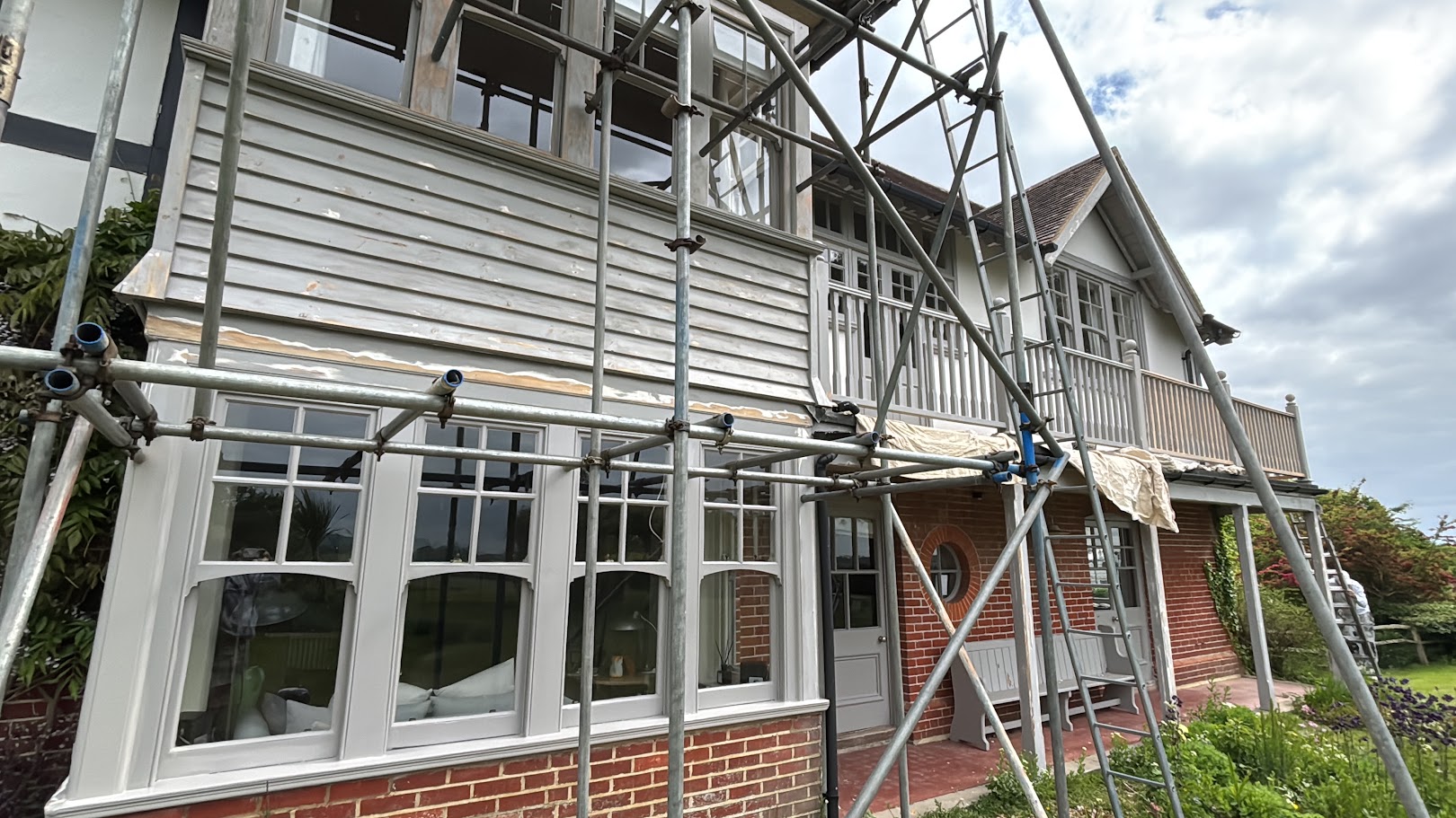 Full exterior painting on a large family home
